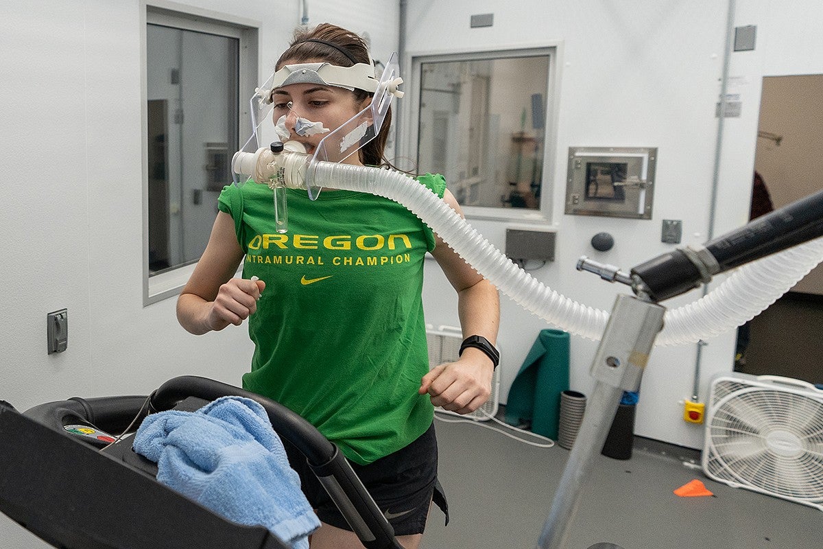 female running on a treadmill